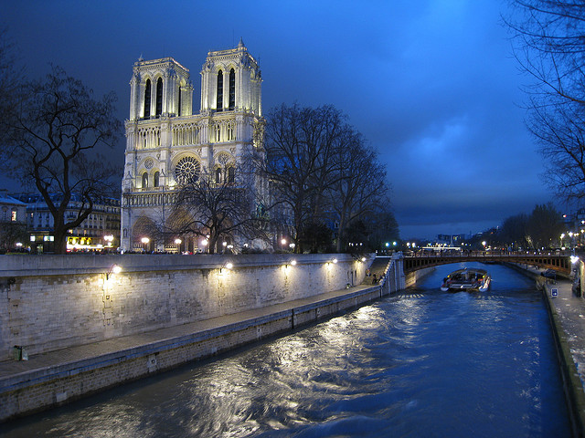 Paris at Night Notre Dame Travelling Internationally